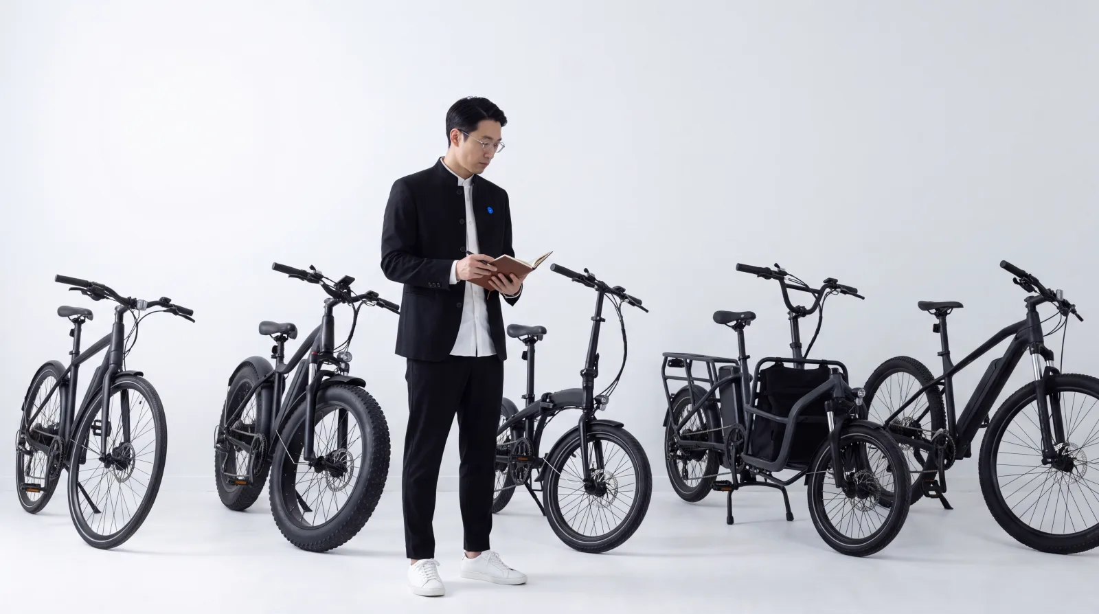 Several categories of electric bikes lined up side by side